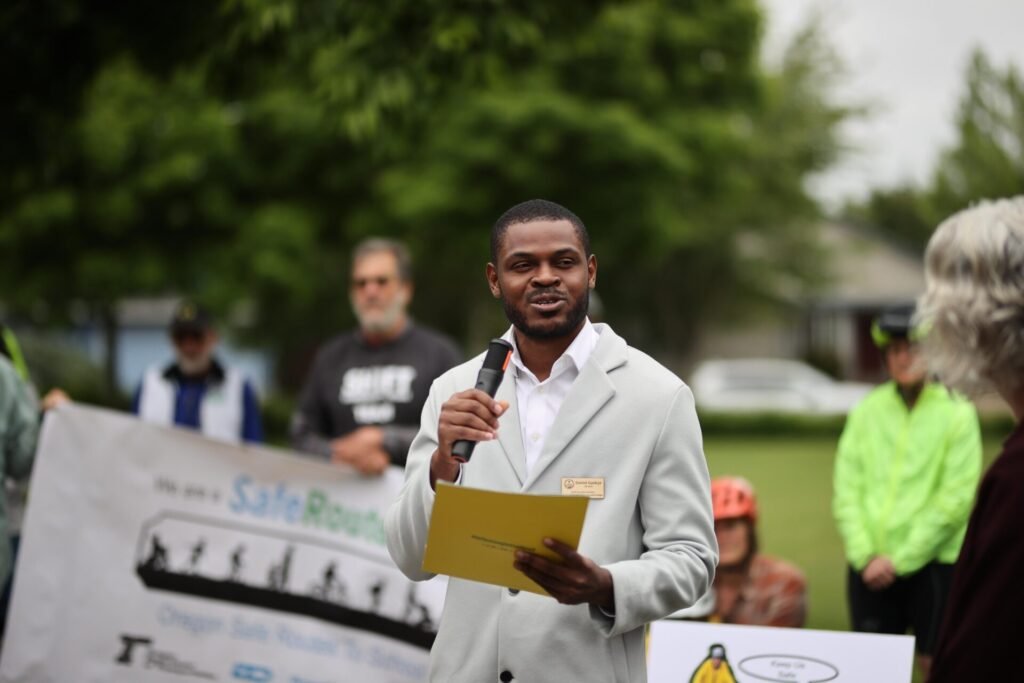 Daniel Appiah Gyekye speaking at a press conference for the Safe Streets Eugene campaign