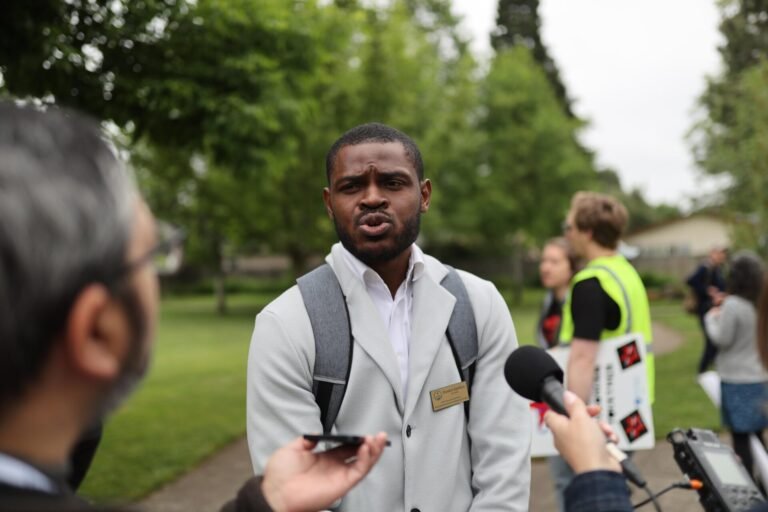 Daniel Appiah Gyekye speaking with the media in Eugene, Oregon