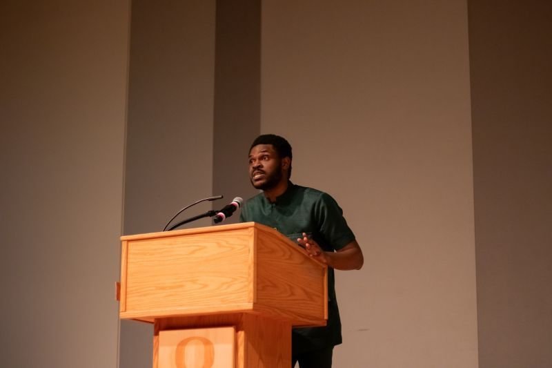 Daniel Appiah Gyekye speaking at a podium