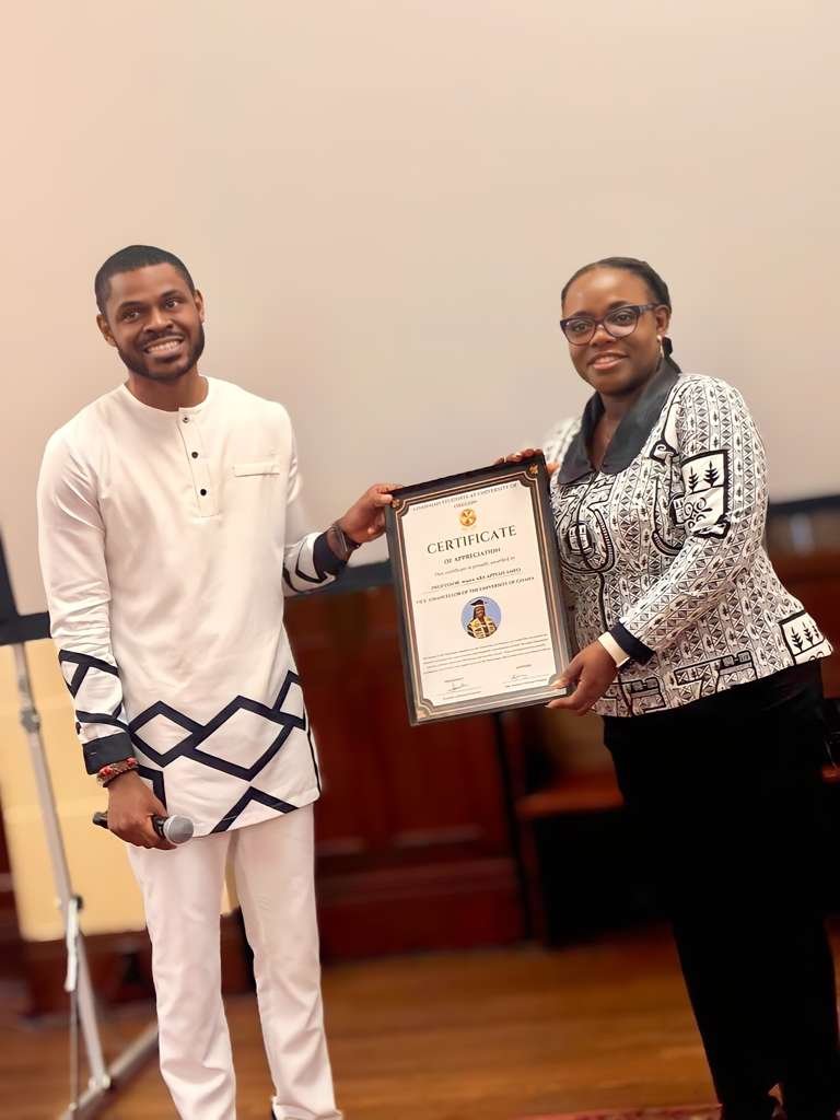 Daniel Appiah Gyekye presenting a citation to Professor Nana Aba Appiah Amfo, Vice-Chancellor of the University of Ghana