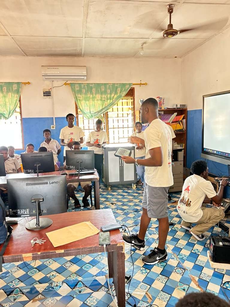 Daniel Appiah Gyekye leading a teacher training session in a computer lab in Krutiase, Ghana