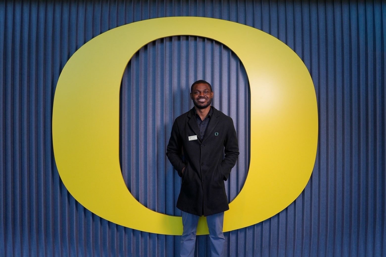 Daniel Appiah Gyekye in front of the University of Oregon O